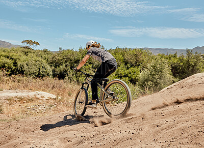 Buy stock photo Bicycle, nature and athlete on a dirt trail for an outdoor adventure, journey or training. Bike, sports and man cycling on off road in a field for exercise, workout or action racing in South Africa.