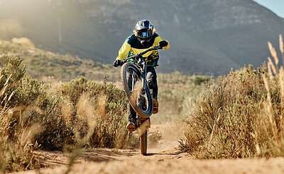 Buy stock photo Mountain biker, dirt bike and dessert rider cycling on sports bicycle on nature path, dirt road and extreme sport performance. Adventure race competition, outdoor racer and cycling in Australia sand 