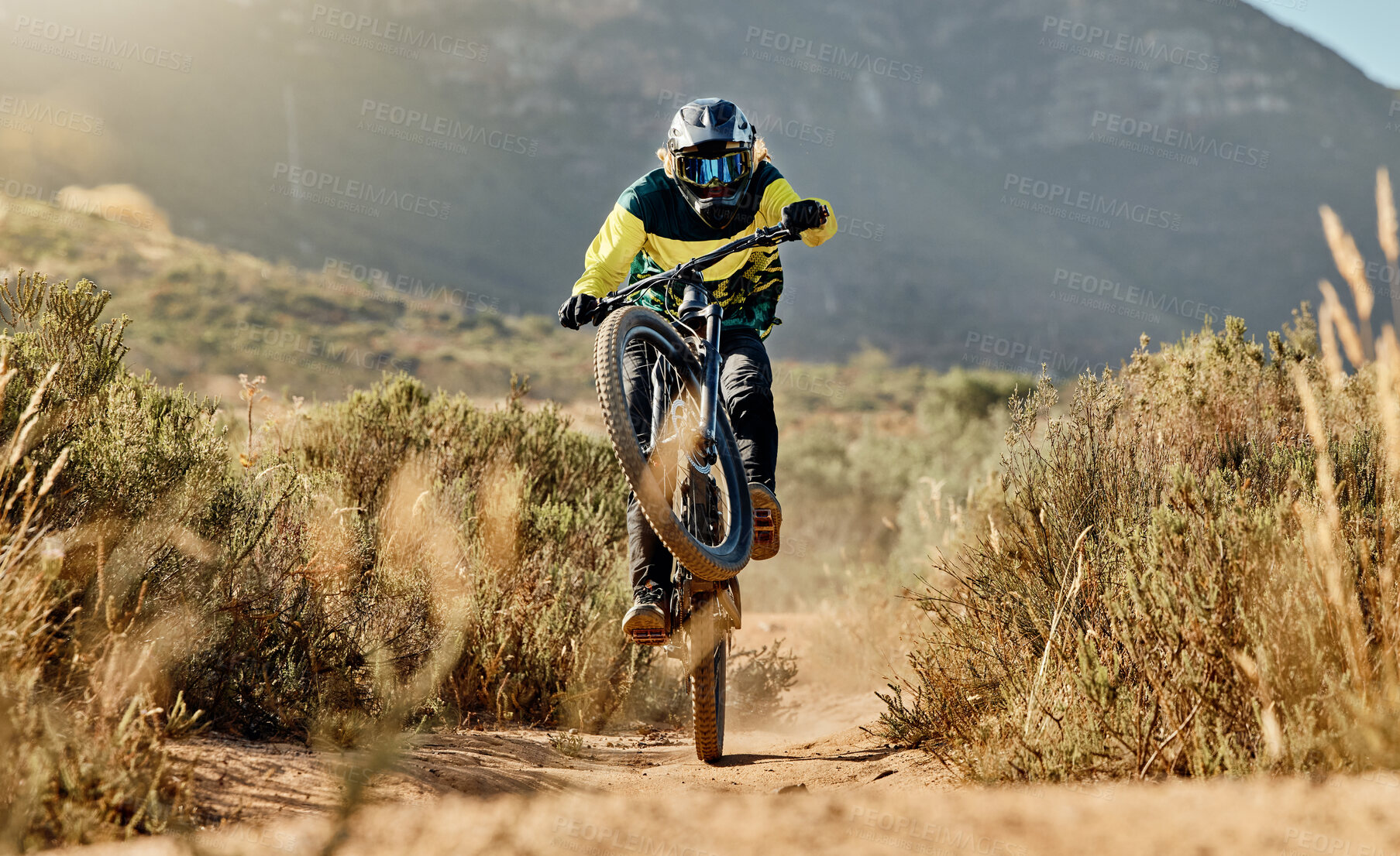 Buy stock photo Mountain biker, dirt bike and dessert rider cycling on sports bicycle on nature path, dirt road and extreme sport performance. Adventure race competition, outdoor racer and cycling in Australia sand 
