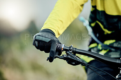 Buy stock photo Cyclist hand, bike handlebar brake and safety on tour, race or ride for fitness, health and wellness in nature. Bicycle handbrake, adventure mountain bike and control speed while outdoor for cycling