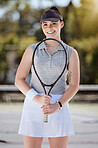 Woman, portrait smile and tennis for sports exercise, training or workout at the court outdoors. Female smiling in sport fitness holding racket in happiness for healthy cardio, game or match outside
