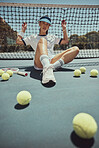 Relax, portrait and tennis woman at net on exercise, fitness and court break at sports ground. Training, workout and cardio of professional athlete club girl resting on floor with tennis balls.
