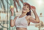 Happy, woman and tennis ball with smile for sports, exercise or fun workout in the summer outdoors. Portrait of female in sport fitness smiling for healthy cardio, tennis or training at the court