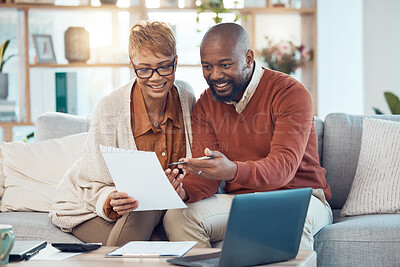 Buy stock photo Finance, paperwork and happy black couple on sofa check bank account, financial statements and report. Budget, saving and middle aged man and woman do online banking on laptop with documents at home