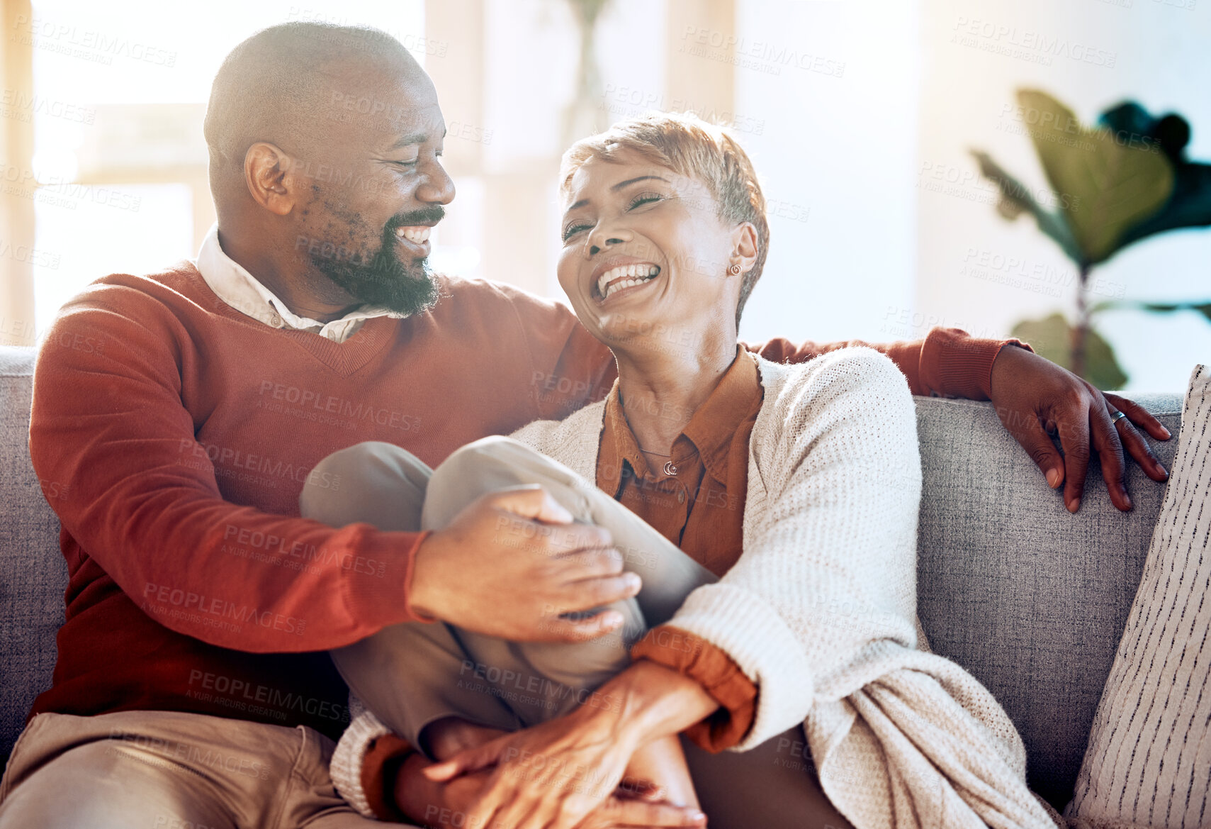 Buy stock photo Relax, happy and love with black couple on sofa for retirement, support and smile together. Marriage, lifestyle and laughing with old man and woman in living room at home for joke, funny and bonding
