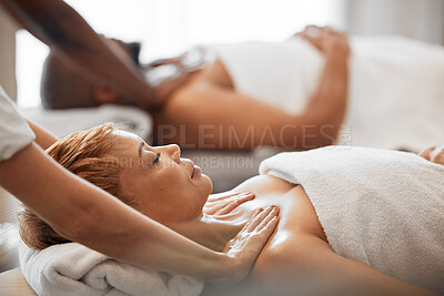 Buy stock photo Massage, relax and couple at a spa for luxury skincare, wellness and therapy for body. Stress relief, health and man and woman with hands from hotel employees for a relaxation treatment at a salon
