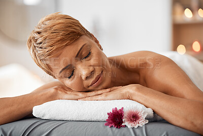 Buy stock photo Relax, massage and woman being peaceful, calm and stress free for tension, laying on table and physical therapy treatment. Spa, mature female and enjoy body care for  wellness, health and resting.