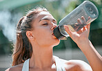 Fitness, relax and drinking water with woman in outdoor for sports, workout and health. Wellness, exercise and summer with girl and water bottle training for energy, endurance and cardio lifestyle
