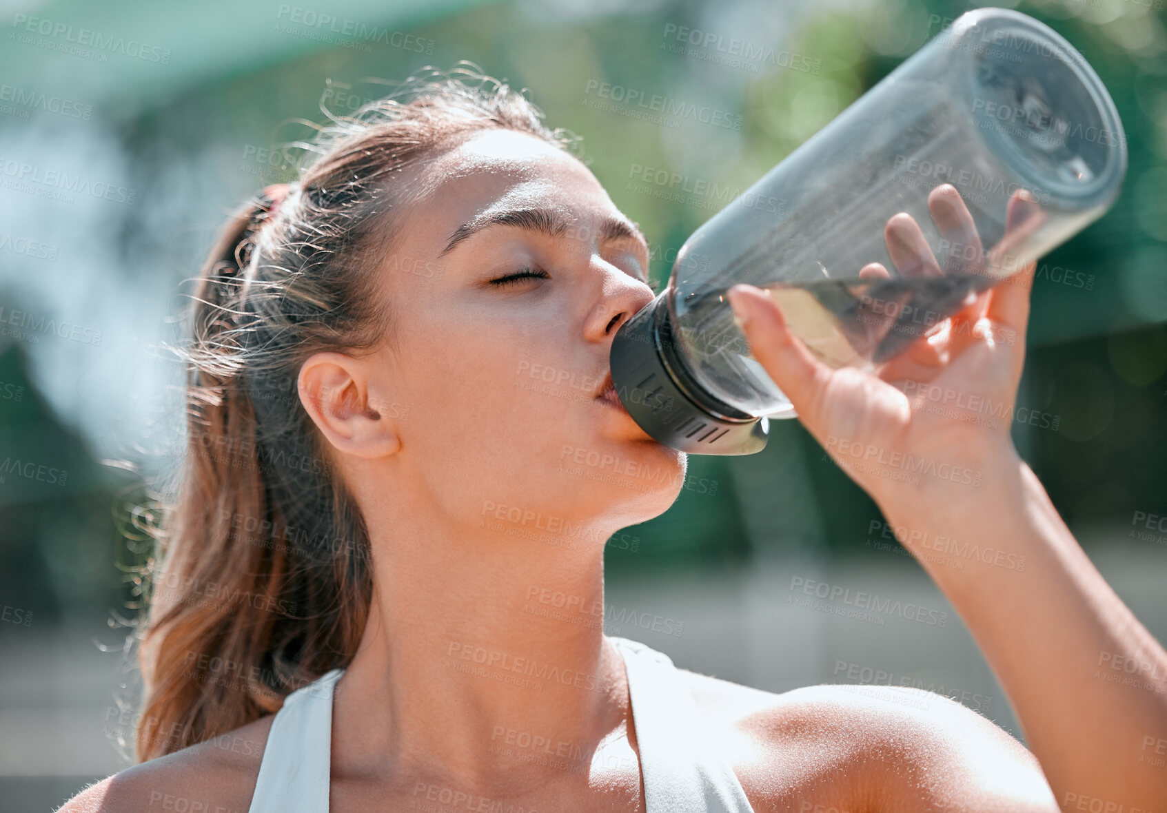 Buy stock photo Fitness, relax and drinking water with woman in outdoor for sports, workout and health. Wellness, exercise and summer with girl and water bottle training for energy, endurance and cardio lifestyle
