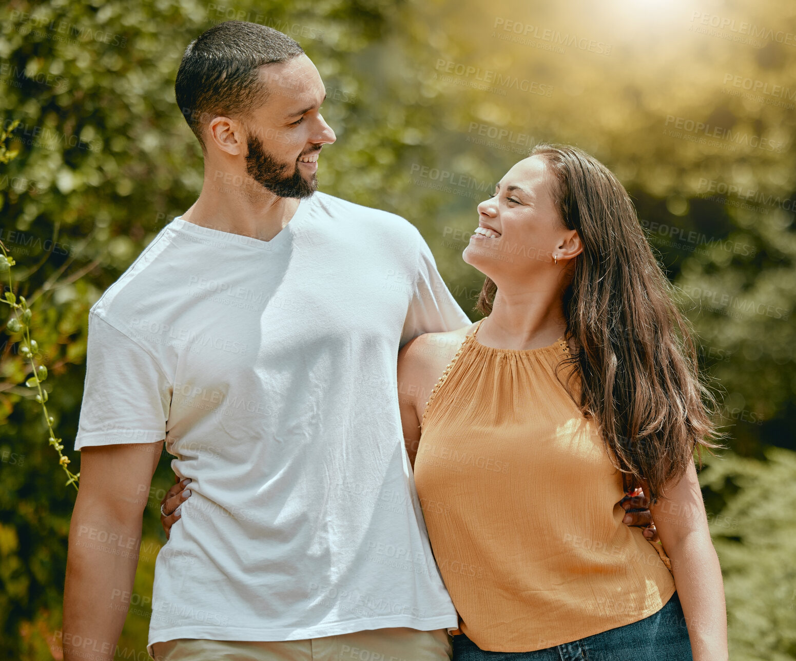 Buy stock photo Love, relax and happy with couple in nature walking together for spring, wellness and smile. Romance, peace and summer with man and woman in park for health, hug and marriage lifestyle or date