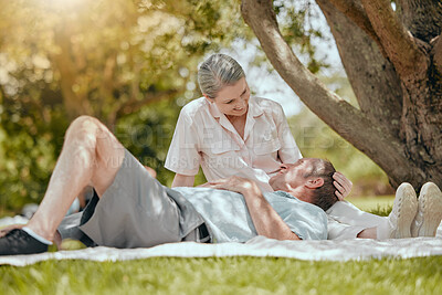 Buy stock photo Love, happy and elderly couple relax on picnic, bond and rest in a park, having fun on a date. Lovers, retirement and senior man and woman sharing romance, happy and smile against forest tree 