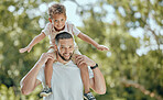 Family, happiness and nature park with dad carrying child on shoulders for fun, adventure and quality time together in summer. Portrait of man and boy outdoor to relax, smile and happy about freedom 