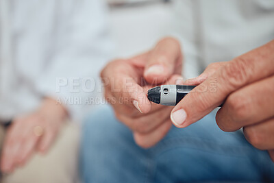 Buy stock photo Man, fingers or diabetes test on glucometer pen in house living room, home or hospital in medical healthcare or insurance check. Zoom, hands or diabetic patient in blood glucose or insulin management