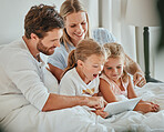 Parents, kids and tablet learning in bedroom, games and watching cartoons on internet, online and relax at home. Happy family of mom, dad and excited children, digital fun and educational app on tech