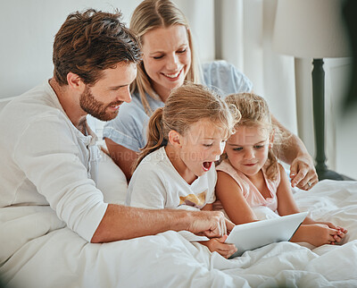 Buy stock photo Parents, kids and tablet learning in bedroom, games and watching cartoons on internet, online and relax at home. Happy family of mom, dad and excited children, digital fun and educational app on tech