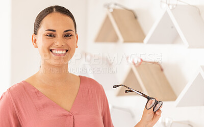 Buy stock photo Portrait, glasses and vision with a woman customer shopping in an optometry store for prescription lenses. Frame, eyewear and choice with a female consumer buying new spectacles for eyesight