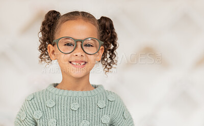 Buy stock photo Kid, girl or face vision glasses in optometrist, ophthalmologist or eye exam clinic for eyes healthcare, wellness or support. Portrait, smile or happy child and optometry prescription or fashion lens