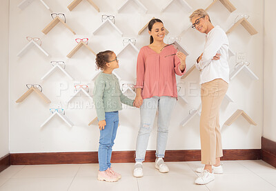 Buy stock photo Glasses, vision and retail store with mother and child shopping for eyewear for vision health. Eyecare, frames and parent with kid buying lenses in ophthalmology store with professional optometrist 