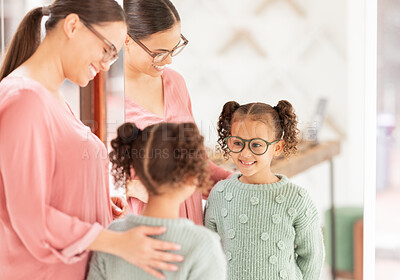 Buy stock photo Family, optics store and shopping with mother and child happy with glasses choice in mirror for eye care, vision and optical health. Woman and girl customer with lens or frame decision in retail shop