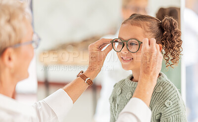 Buy stock photo Vision, eye care glasses and child with optometrist for ophthalmology consultation, help or support with eyesight. Healthcare service, optical check and expert consulting youth patient at eye exam