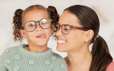 Buy stock photo Family, glasses and happiness with mother and child happy with optics, eye care and lens frame choice for vision, focus and eyesight. Portrait of woman and comic girl with tongue for optical decision