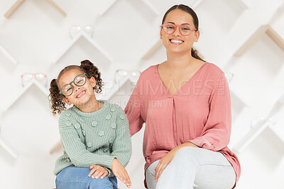 Buy stock photo Family, eye care and glasses on mother and child in optics store for shopping, optometry and health care while advertising lens or frame choice. Portrait of woman and girl happy with vision insurance