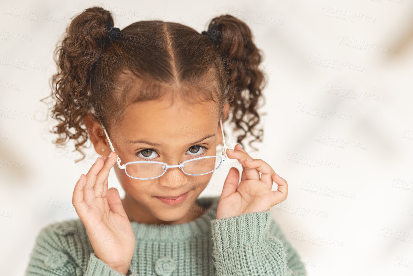 Buy stock photo Little girl, glasses and vision portrait with a child wearing eyeglasses in eyewear store for eye care. Optometry, ophthalmology and cute female child posing with spectacles and lenses in retail shop