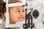 Vision, test and girl for eye exam in the opthalmologist office with equipment for glasses. Optics, examination and female child testing for eyecare health or wellness for optometry for healthcare