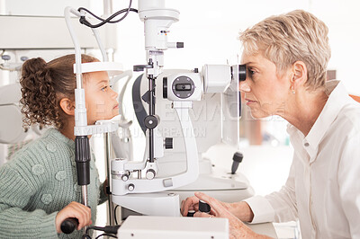 Buy stock photo Eye, test and child vision exam for health, wellness and eye care with a medical doctor or optometrist. Equipment, ophthalmology and female kid in optometry examination for glasses and eyewear 