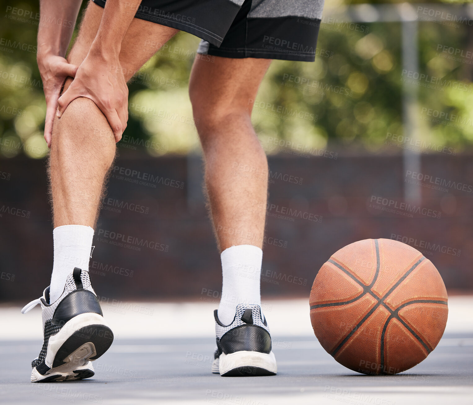 Buy stock photo Man legs, injury and basketball athlete in pain on court for fitness exercise. Sports medical accident, torn muscle or leg osteoporosis emergency after workout training in sport park outdoors