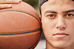 Basketball, sports and portrait of face with ball, basketball player standing in outdoor court. Fitness, exercise and closeup of man with focus, motivation and inspiration to win game and training