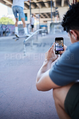 Buy stock photo Phone, skateboard and man recording video in street, city or outdoors. Tech, skater and male record friends skating or training on 5g mobile smartphone for social media, internet or web post online.