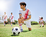 Sports, team and soccer training, stretching and warm up before game competition on field. Young athlete men, fitness workout and football exercise practice or sport lifestyle motivation outdoors