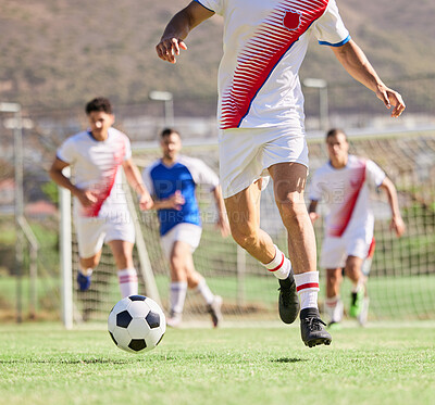 Soccer, team and running in sports game, fitness or exercise with the ball on the field in the outdoors. Group of football players on the attack for goal, score or match point on the soccer field