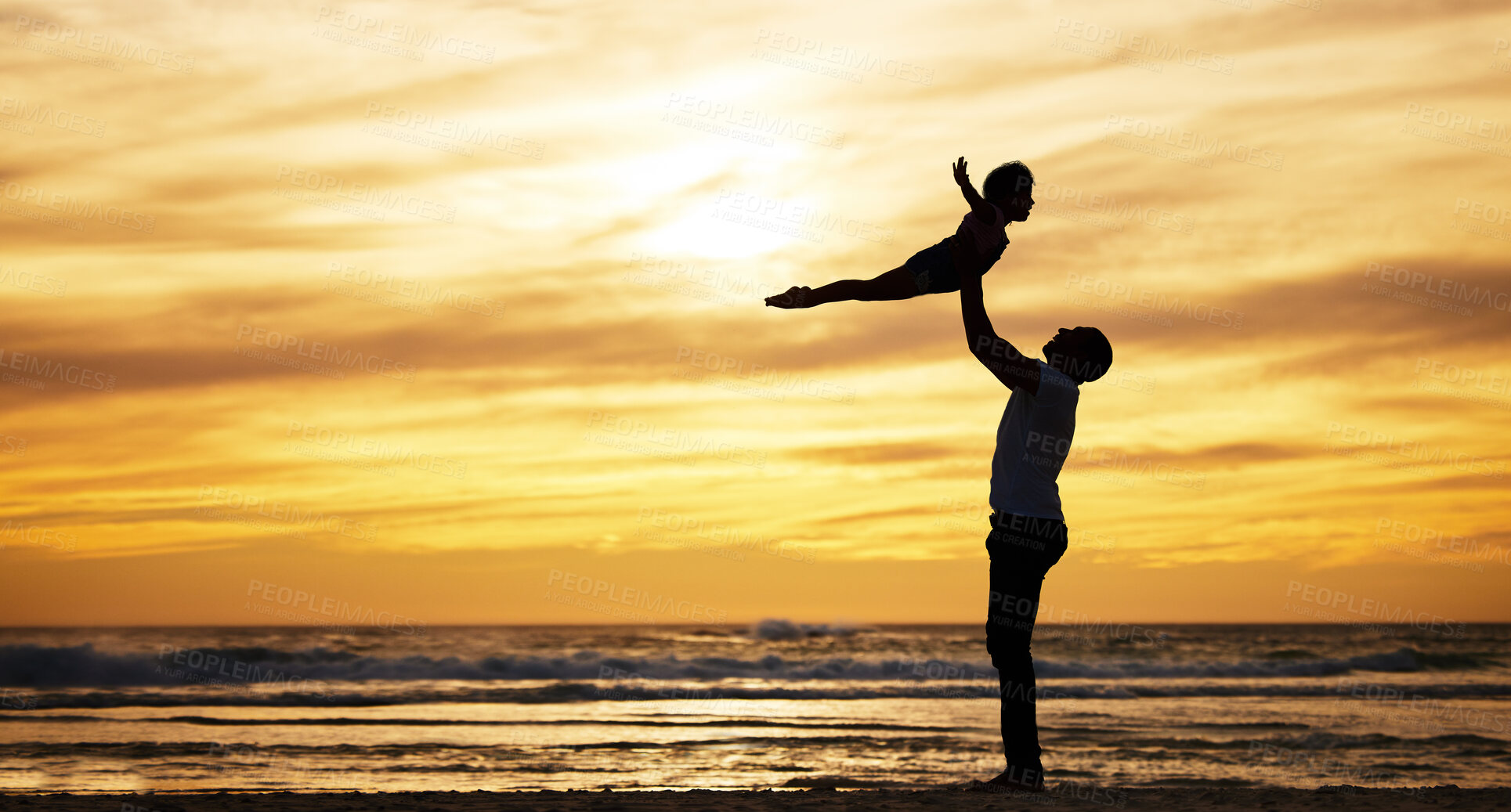 Buy stock photo Family, silhouette and sunset by beach with dad lifting child in air to fly while on vacation in summer with love, care and support outdoor. Man and kid playing airplane while on holiday by sea