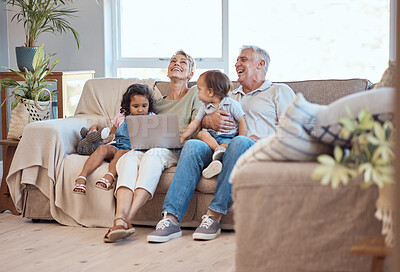Buy stock photo Happy, family and laptop on the sofa with children and grandparents on home sofa. Senior man and woman relax online with their adopted grandchildren while watching funny movie, streaming or cartoon