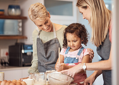 Buy stock photo Grandma, mother and child baking in kitchen together while girl learns to mix cake mixture, pancake batter or muffin mix. Family cooking dessert, kid learning and cooking snack food for home dinner  