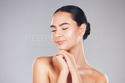 Buy stock photo Face, beauty and skincare of woman with eyes closed on gray studio background. Makeup aesthetics, wellness or female model from Canada with healthy skin after facial or dermatology treatment mockup.