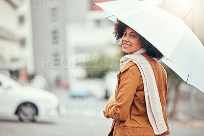 Buy stock photo Winter, smile and woman with an umbrella for the rain while walking in the city of Portugal. Street, happy and young girl with autumn fashion on a walk in the road for peace, calm and happiness
