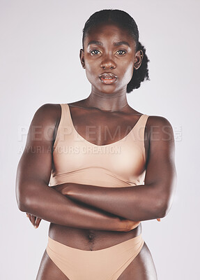 Buy stock photo Health, wellness and portrait of a black woman in underwear standing in a studio with a natural slim body. Beauty, natural and healthy African woman model with body care isolated on gray background.