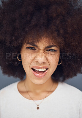 Buy stock photo Confused, afro and face of a woman thinking of a decision against a grey studio background. Doubt, uncertain and portrait head of a young girl looking puzzled, doubtful and with a facial reaction