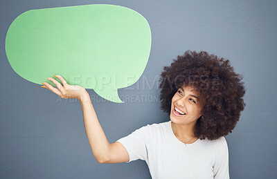 Buy stock photo Happy black woman, speech bubble and studio background mockup space for advertising or product placement. Smile on face, information announcement for small business discount sale and excited woman.