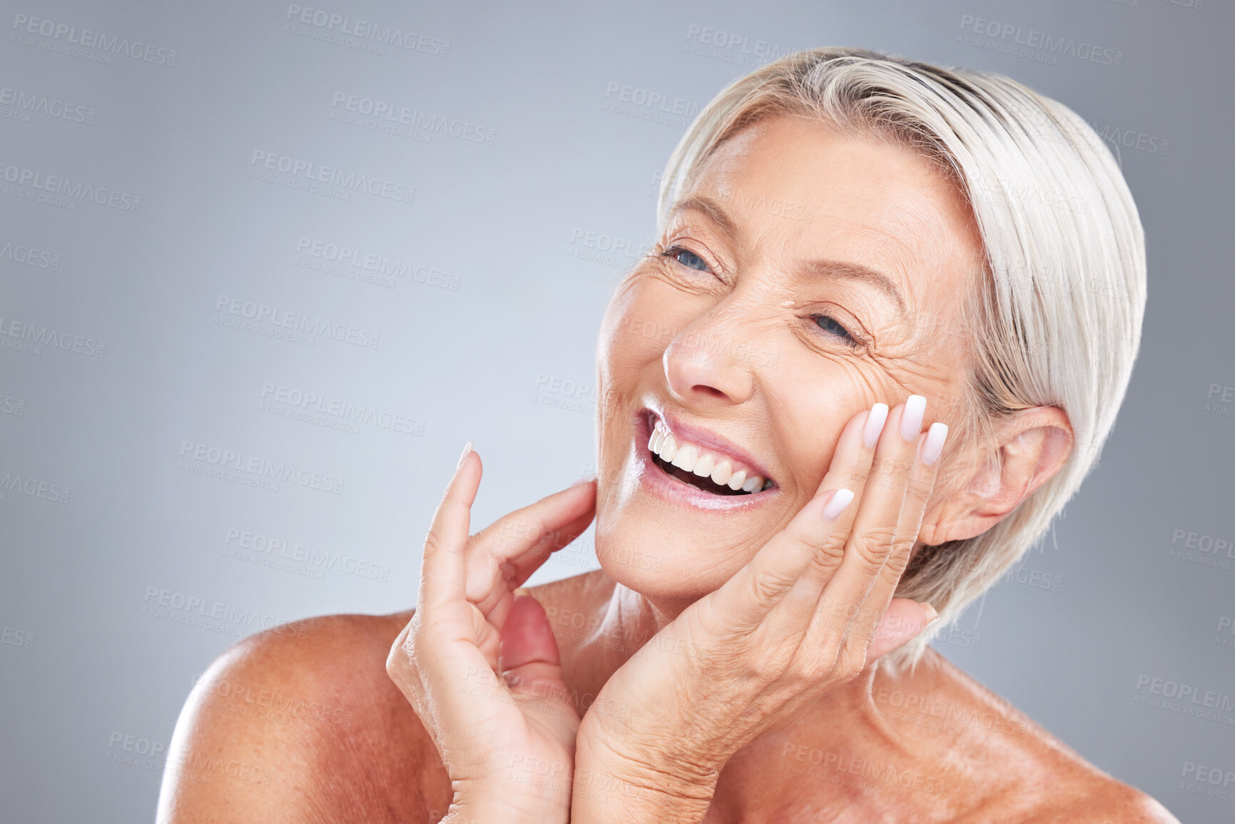 Buy stock photo Skincare, beauty and senior woman with smile isolated in gray background studio. Wellness, dermatology and old female with natural skin and wrinkles pose for cosmetics, makeup and skincare products