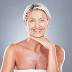 Senior woman, smile and skincare face, makeup and happy with beauty, smile and cosmetics in studio portrait. Elderly model, happiness or skin cosmetic, shine or glow for healthy, facial or wellness