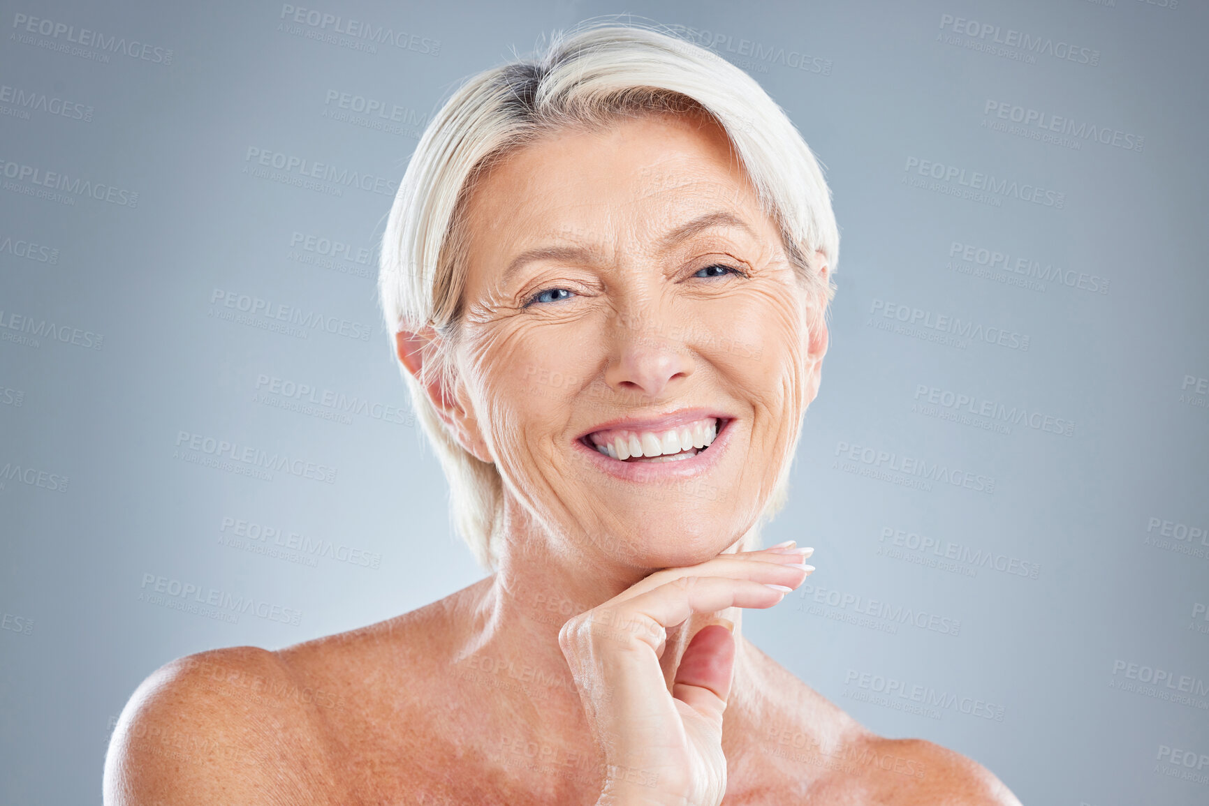 Buy stock photo Beauty, skincare and elderly woman from Germany happy about healthy skin and wellness. Cosmetic, happiness and senior person holding her face after a facial, botox or dermatology spa treatment