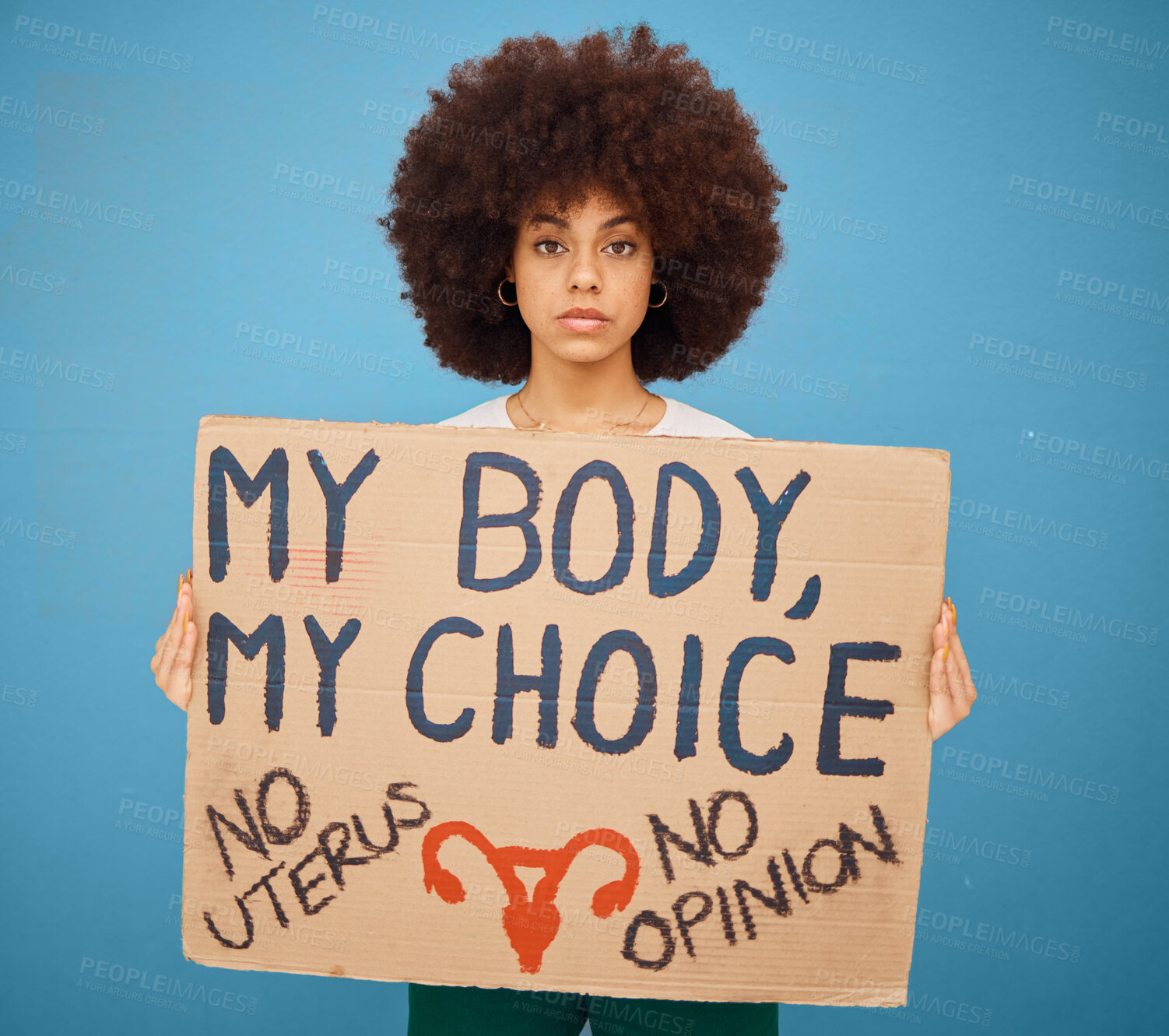 Buy stock photo Protest, human rights and woman with a poster for abortion, body freedom and justice against a blue studio background. Choice, equality and portrait of an African girl with a board for a riot