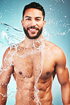 Fitness, skincare and water splash, man on studio background, happy and topless in Brazil. Health, wellness and fresh clean water, sports guy with muscles, healthy mindset and body positive lifestyle