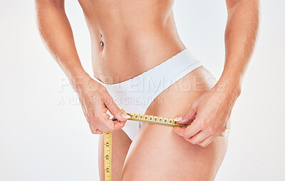 Premium Photo  Weightloss health and woman with measuring tape in a studio  for her diet exercise or wellness fitness body and healthy slim female  model checking the measurement of her waist