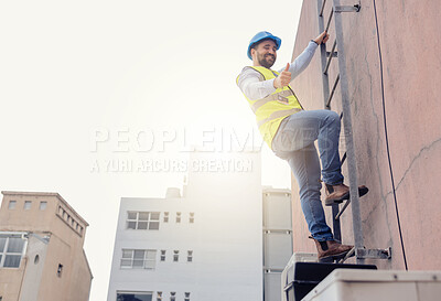 Buy stock photo Engineer, ladder and thumbs up with man climbing on a building during construction inspection. Agree, approve and thumbsup with builder working on building architecture for maintenance and repair 