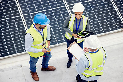 Buy stock photo Top view, engineer teamwork and planning of solar panel maintenance, inspection or installation. Solar energy, renewable energy and group of contractors with tablet, tech or checklist in discussion.